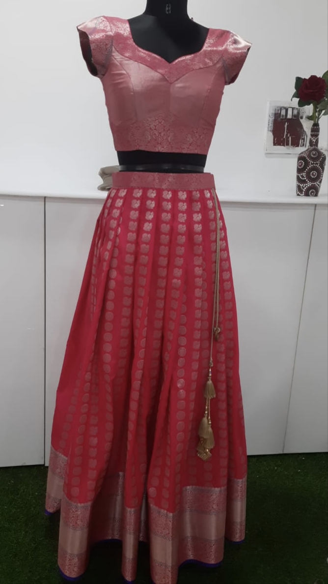 Rose pink and magenta lehenga with gold border